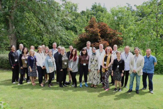 Team photo with International Partners, June 2022