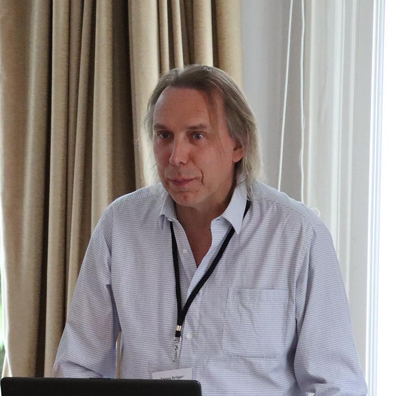 Professor Teppo Kroger speaking at event in June 2022