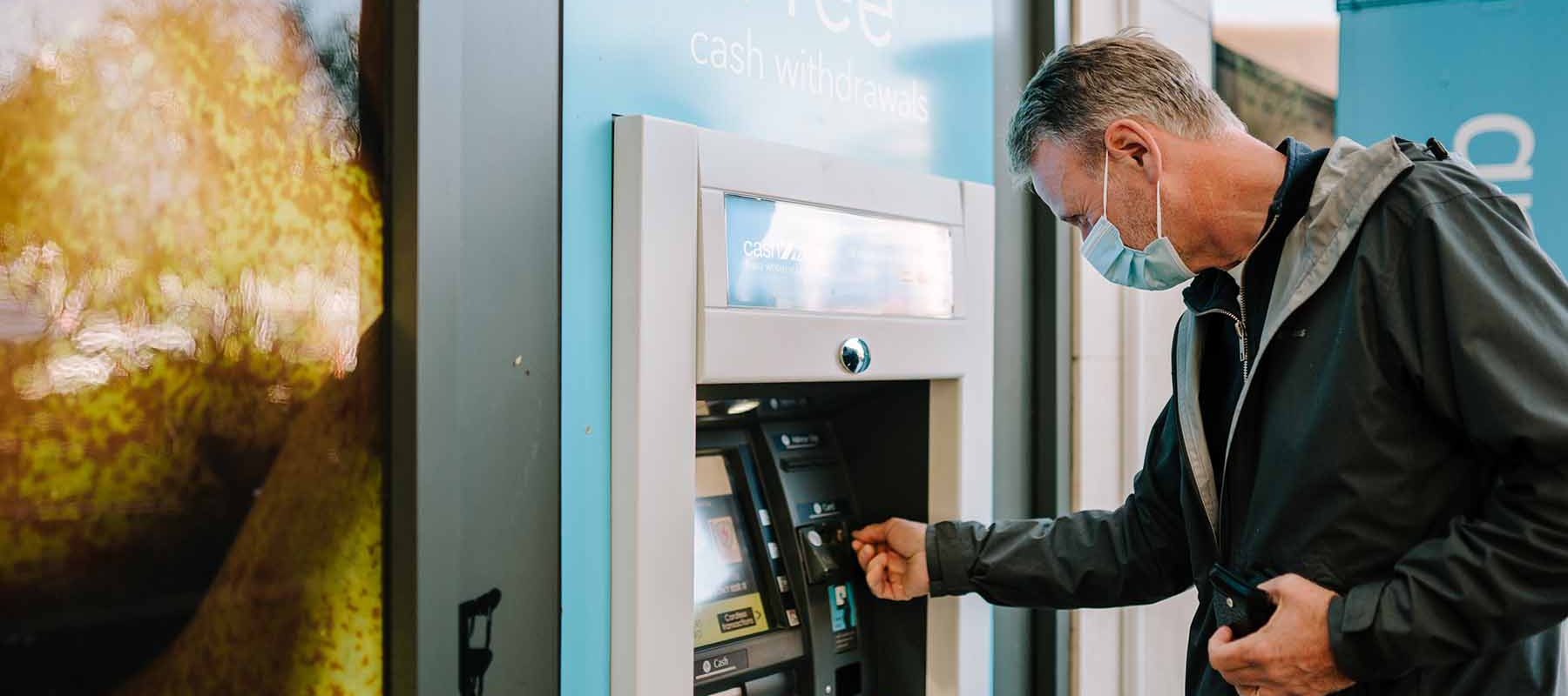 Older person using ATM