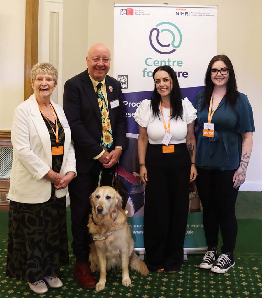 4 people and assistance dog at the House of Commons