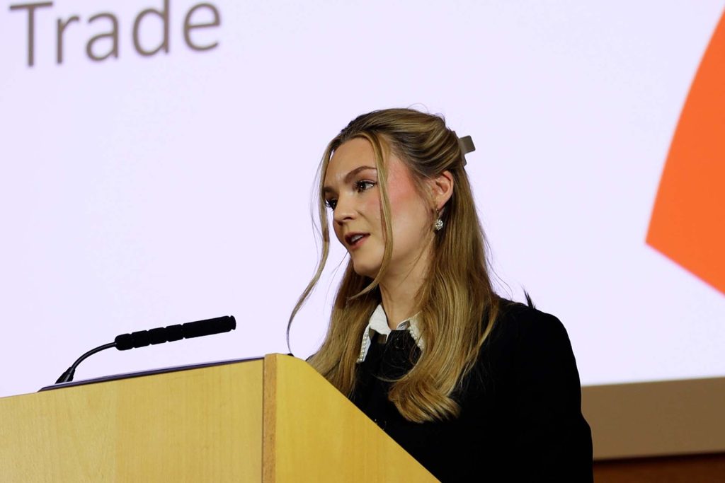 Kate Dearden MP speaking at a conference