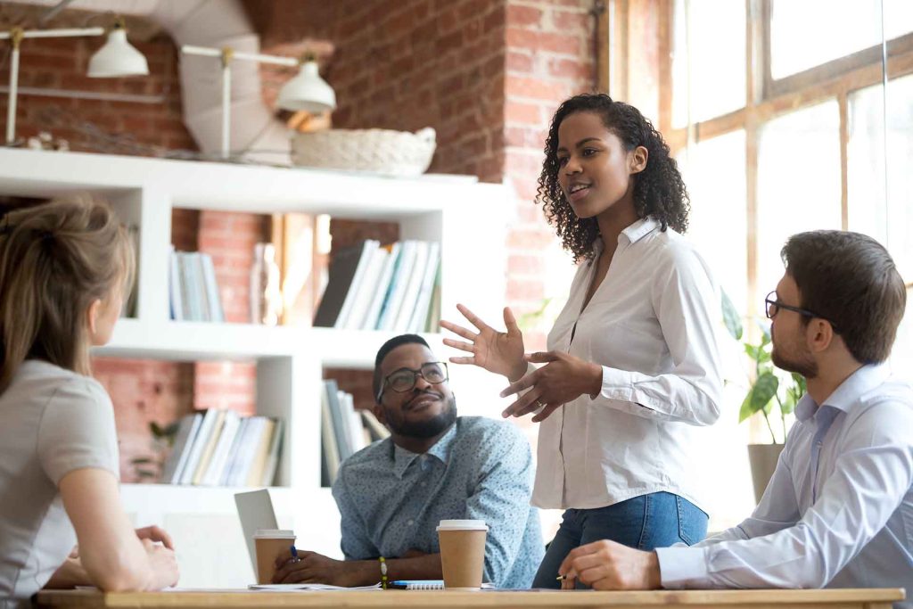 four people on a meeting