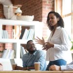 four people on a meeting