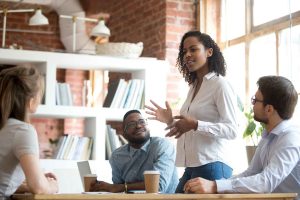 four people on a meeting